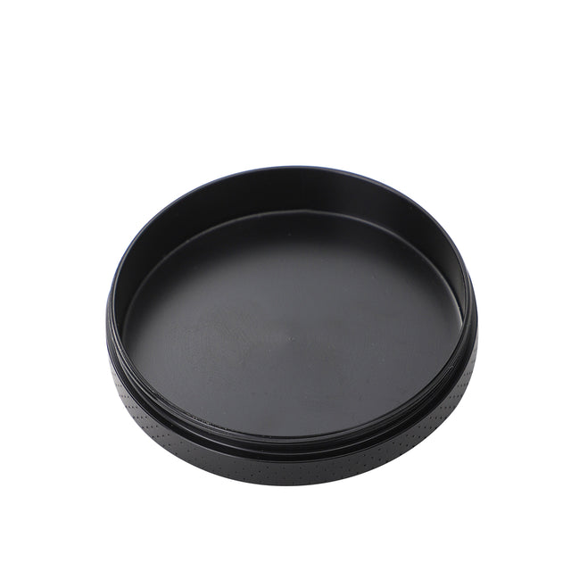 Collection tray at the bottom of the grinder